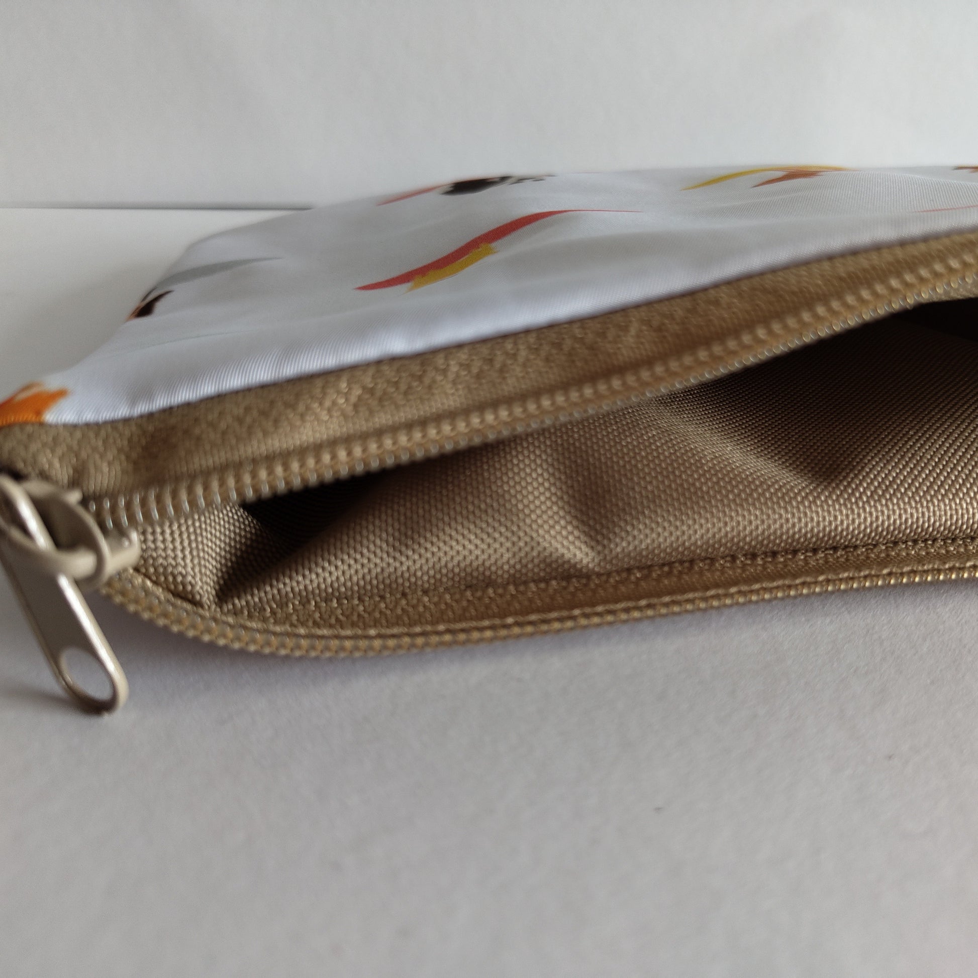 Surfing dog water-repellent pouchThe Rebels Co.Surfing dog water-repellent pouch